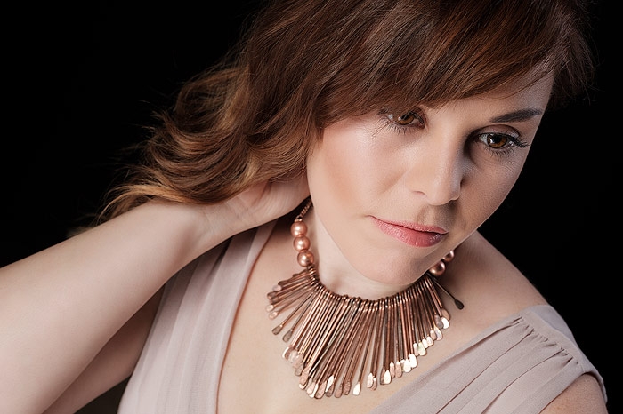 Jewellery model Aimee wearing bronze necklace