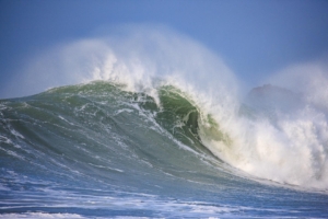 A giant wave breaks during a storm at Portinfer.