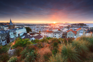 Sunrise over St Peter Port harbour, viewed from Mignot Plateau.