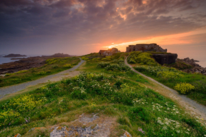 Sunset over Grandes Rocques Fort, Guernsey.