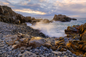 A tiny pebble beach hidden away on L'Ancresse Common.