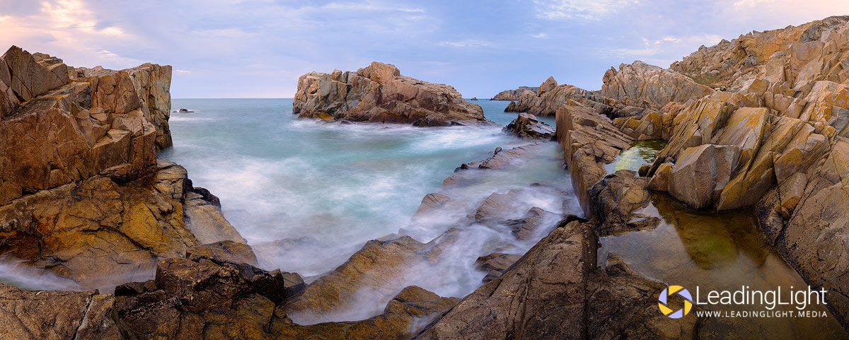 Stepped rocks help lead the eye into this pamorama at an outcrop of rocks in L'Ancresse Bay, Guernsey.