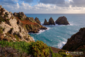 The Peastacks on Guernsey's south coast, bathed in warm autumn light.