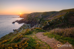 Springtime sunset over cliffs near Le Prevote on Guernsey's south coast.